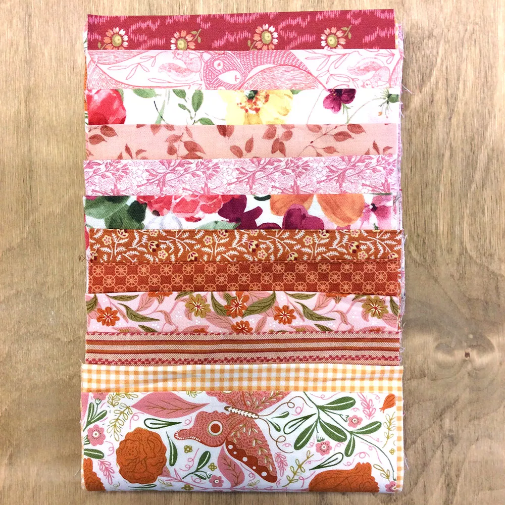 FB -Outrageous OrangesFabric Bundle – 12 unique .15m strips of fabric